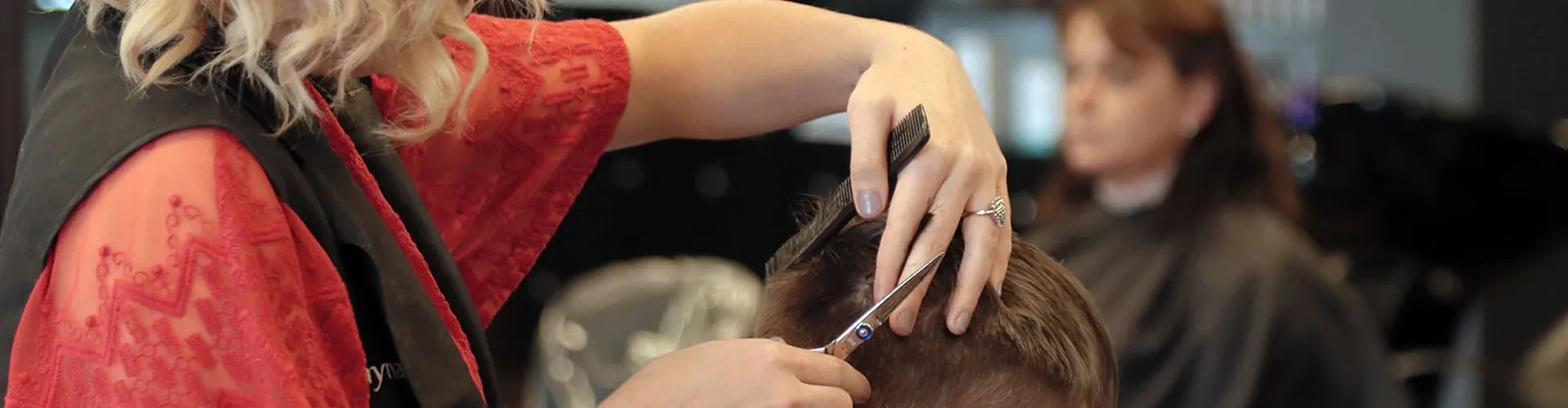 A precision cut in progress melting into the styled-out result